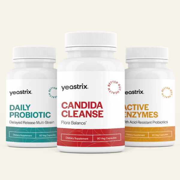 Three supplement bottles labeled: "Daily Probiotic," "Candida Cleanse," and "Active Enzymes," each containing 90 capsules.