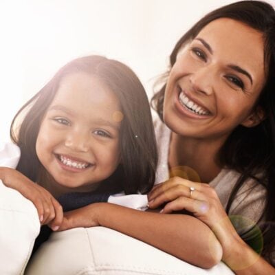 Happy mother and child with healthy glowing skin after healing gut skin axis naturally