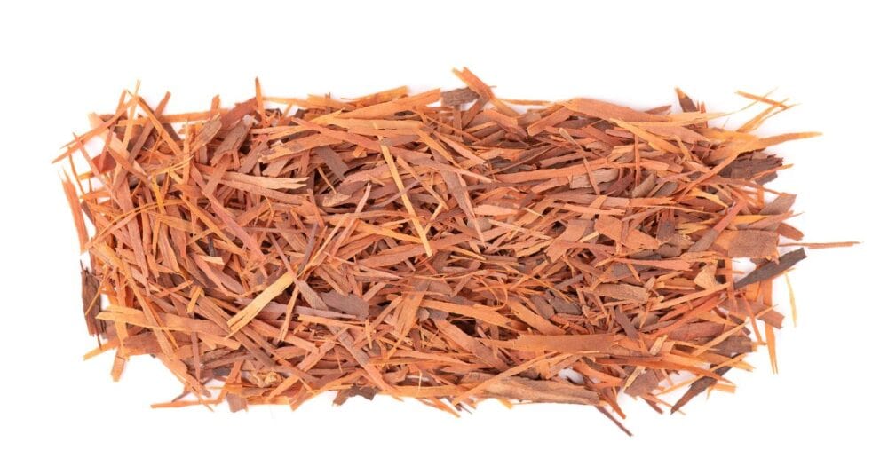 Shredded Pau d'Arco inner bark (Lapacho), traditionally used in South American herbal medicine and commonly included in digestive health supplements.